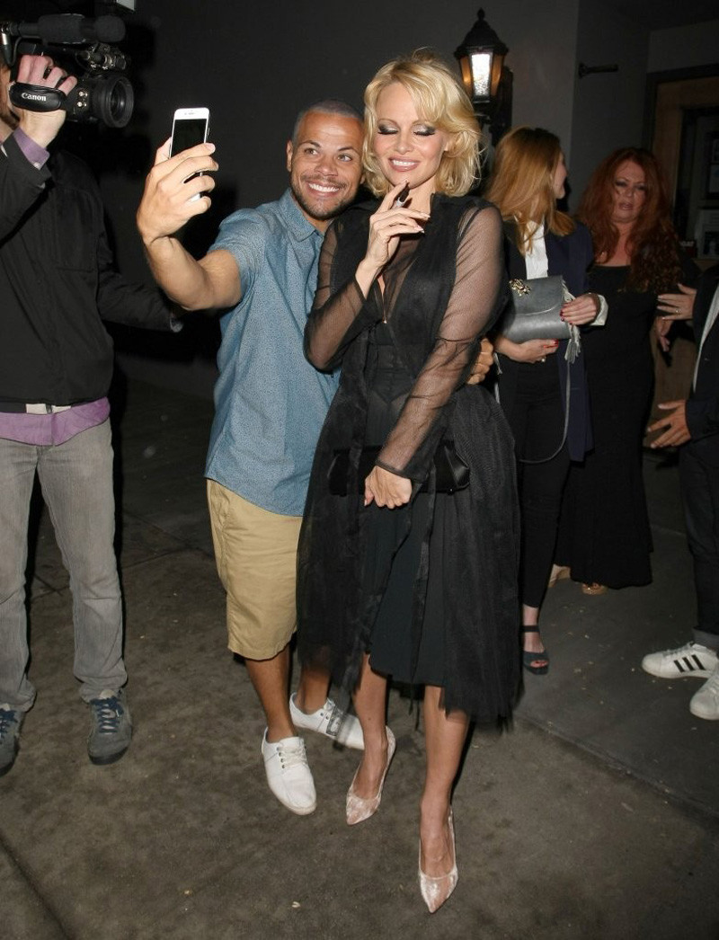 Pamela Anderson Braless